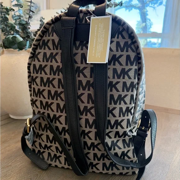 Michael Kors Black and Tan Logo Backpack - Picture 2 of 9